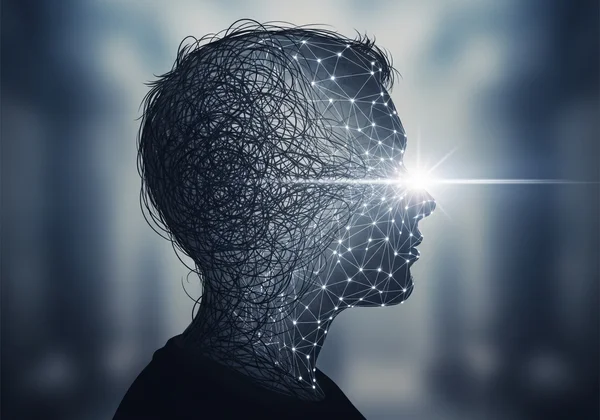 A person sitting at a desk, thoughtfully filling out a self-assessment form on a tablet.